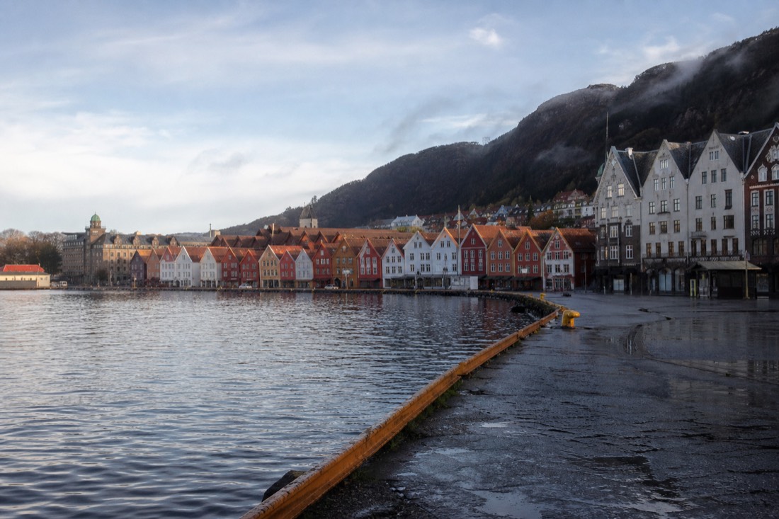 Early morning light on the wooden Bryggen wharf buildings with an empty quayside